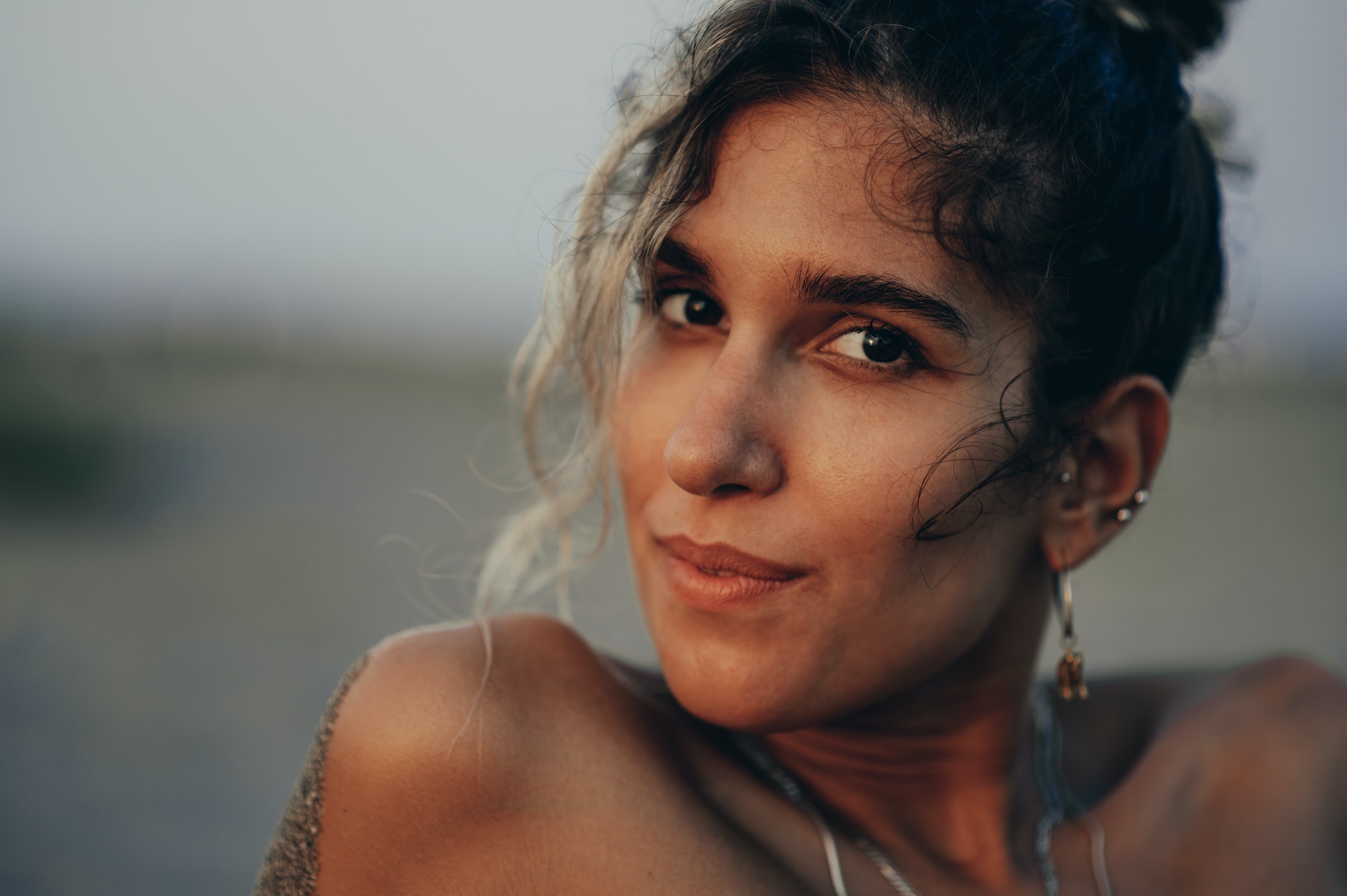 Portrait photo of a beautiful girl posing outside