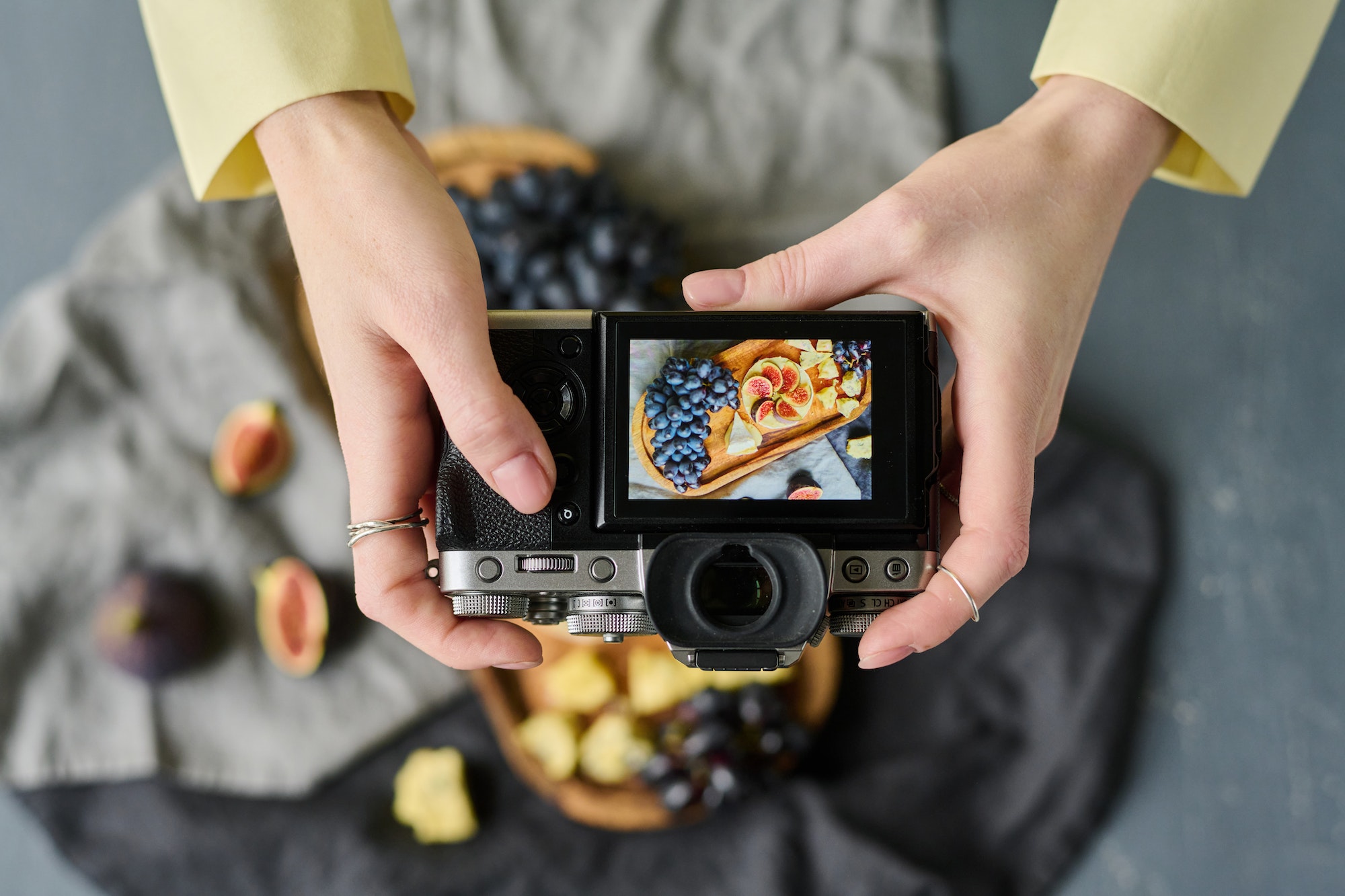 Woman photographing food on the phone